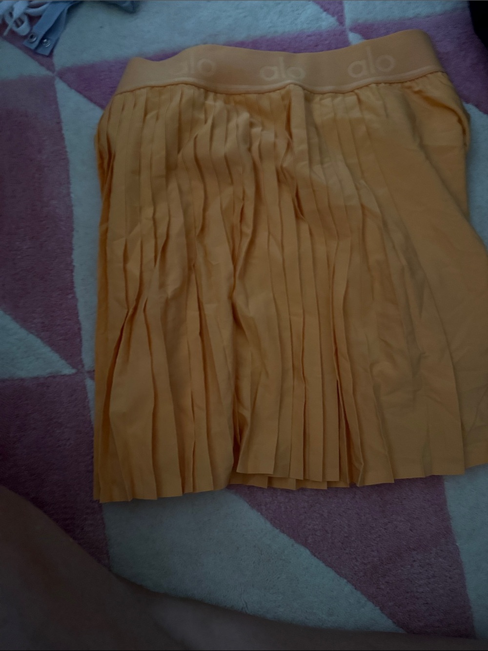 ALO Yoga Pleated Mini Skirt in Light Mustard